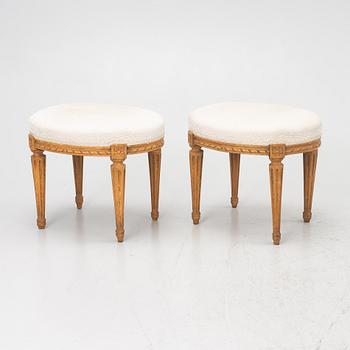 A pair of Louis XVI-style stools, late 19th century.