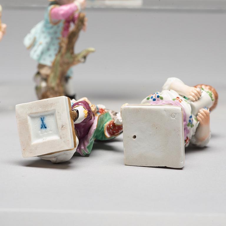 A group of five porcelain figurines of children, Meissen and Vienna.