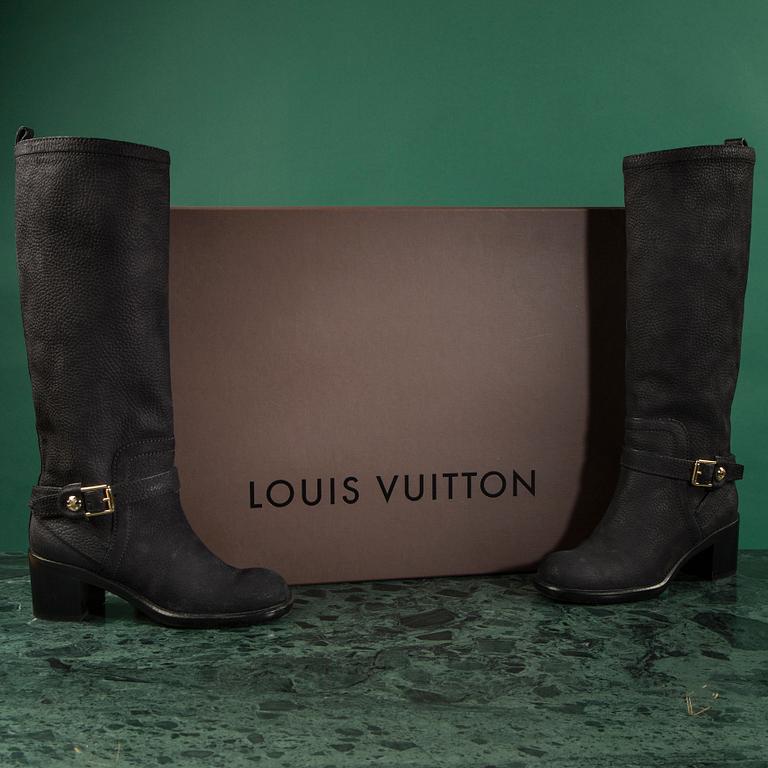 Boots, by Louis Vuitton.