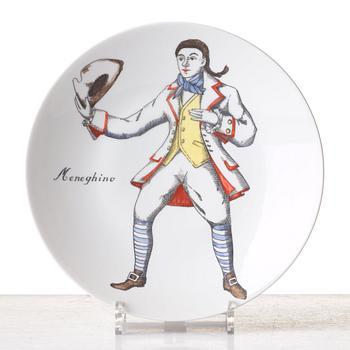 Piero Fornasetti, a set of 12 "Maschere Italiane" porcelain plates, Milan, Italy.