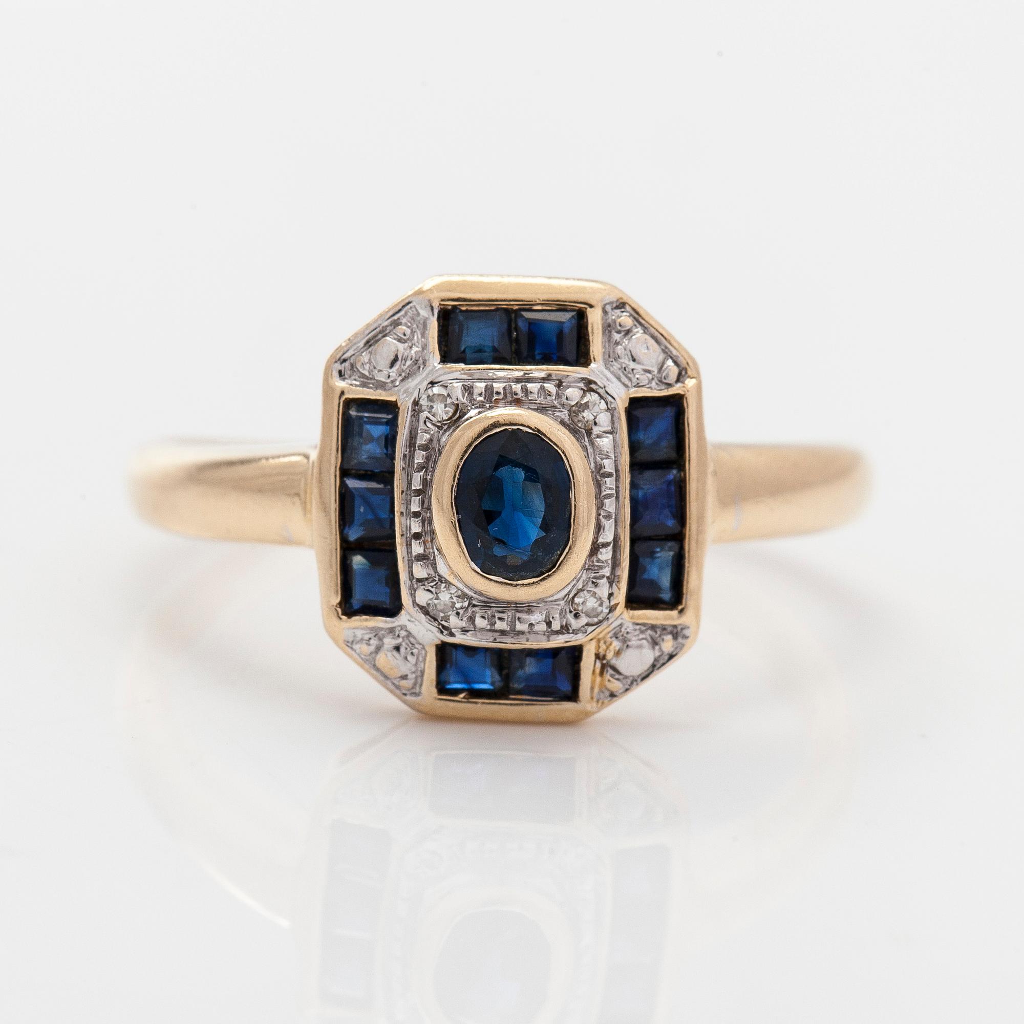 A 14K gold ring with sapphires and eight-cut diamonds. Finnish import marks 1994.