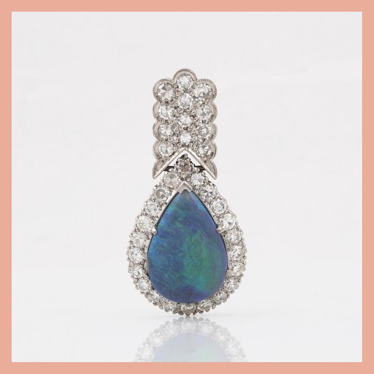 HÄNGE med opal ca 3ct samt åttkantsslipade diamanter totalt ca 1.00 ct.