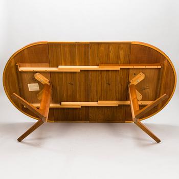 NIELS OLE MØLLER, A mid-20th-century extending dining table for Gudme Möbelfabrik, Denmark.