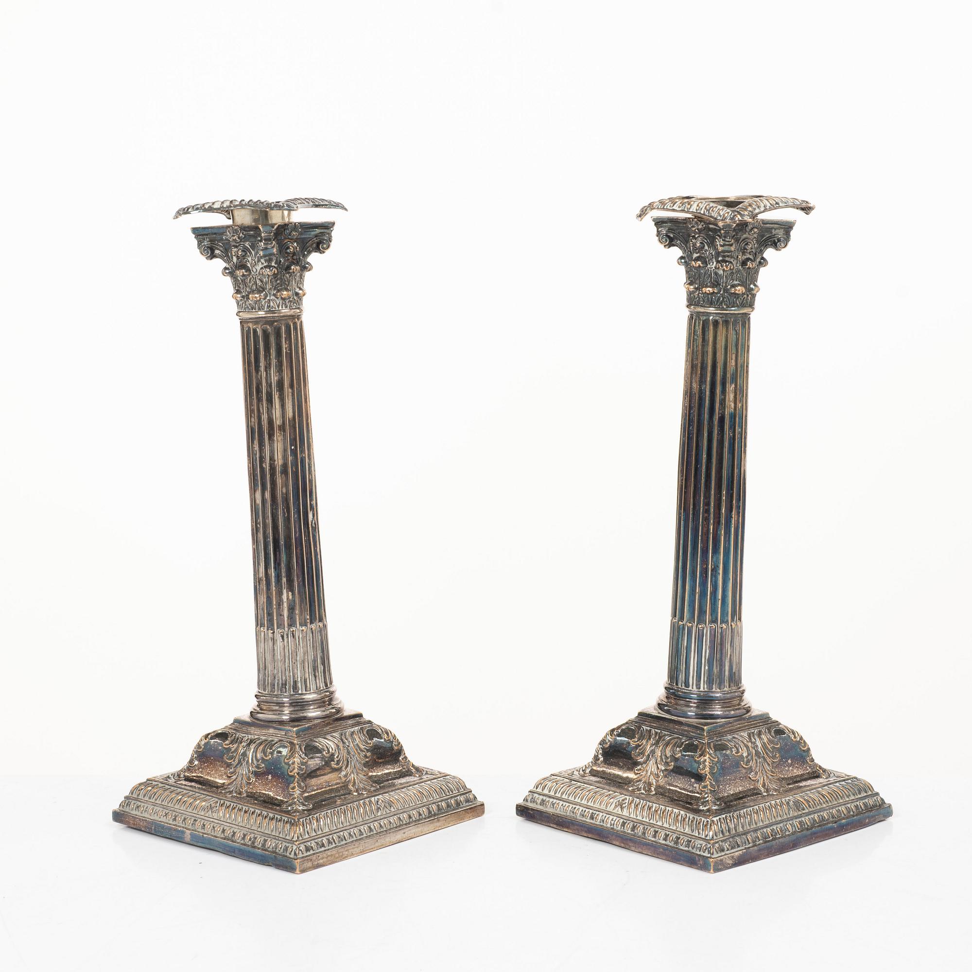 A pair of silver plate candlesticks, no marks, 20th century.