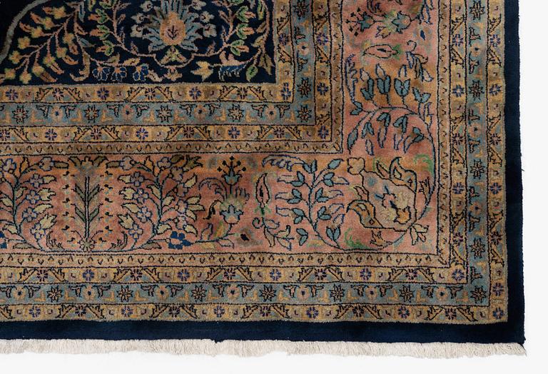 An India Carpet, c. 380 x 285 cm.
