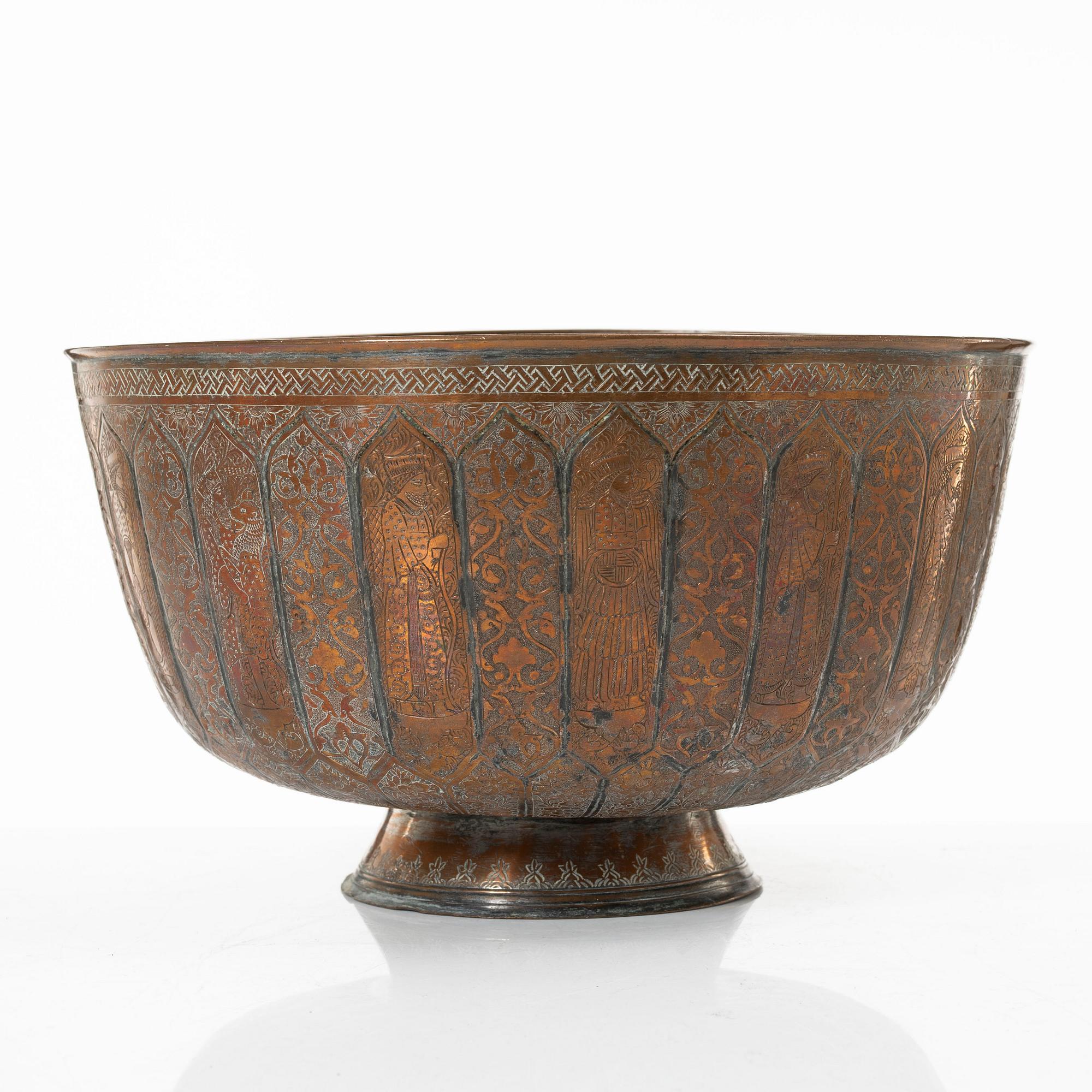 A large Persian copper bowl, late Qajar dynasty / early 1900s.