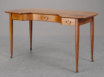 A Josef Frank mahogany desk, Firma Svenskt Tenn.