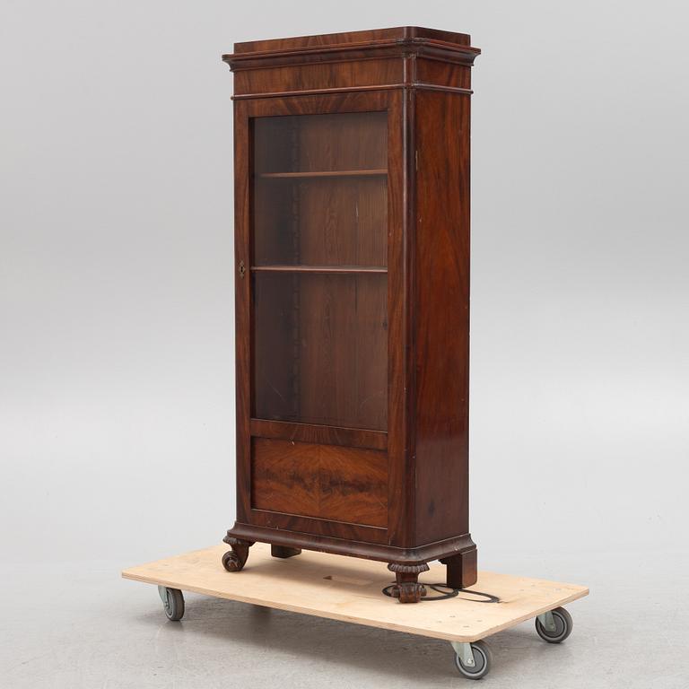 A Swedish late Empire mahogany book cabinet, ca 1830's.