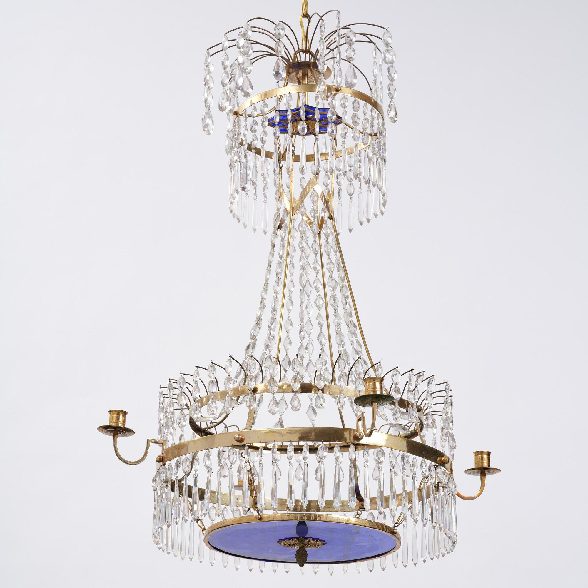 A late-Gustavian five-light gilt brass and cut glass chandelier, Stockholm, late 18th century.