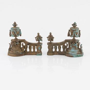 A Louis XVI style bronze grate, 19th Century.