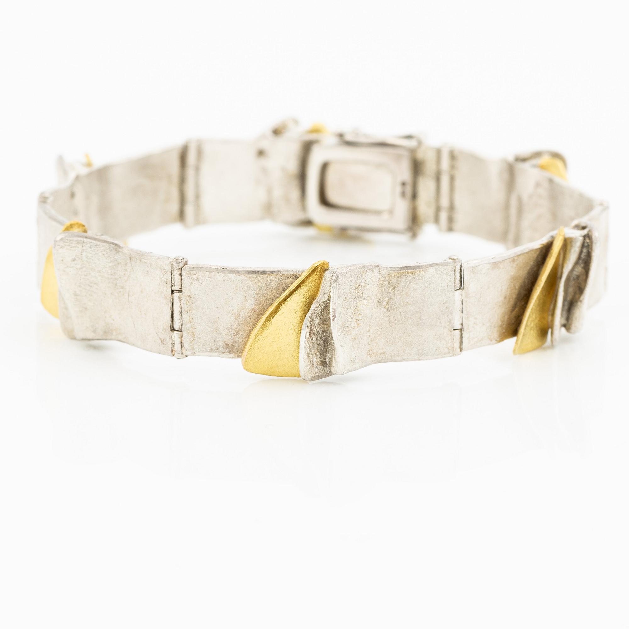 Bracelet silver and gilded silver.