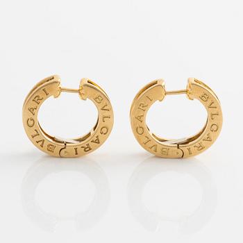 Bulgari a pair of earrings "B.zero 1" in 18K gold with round brilliant-cut diamonds.