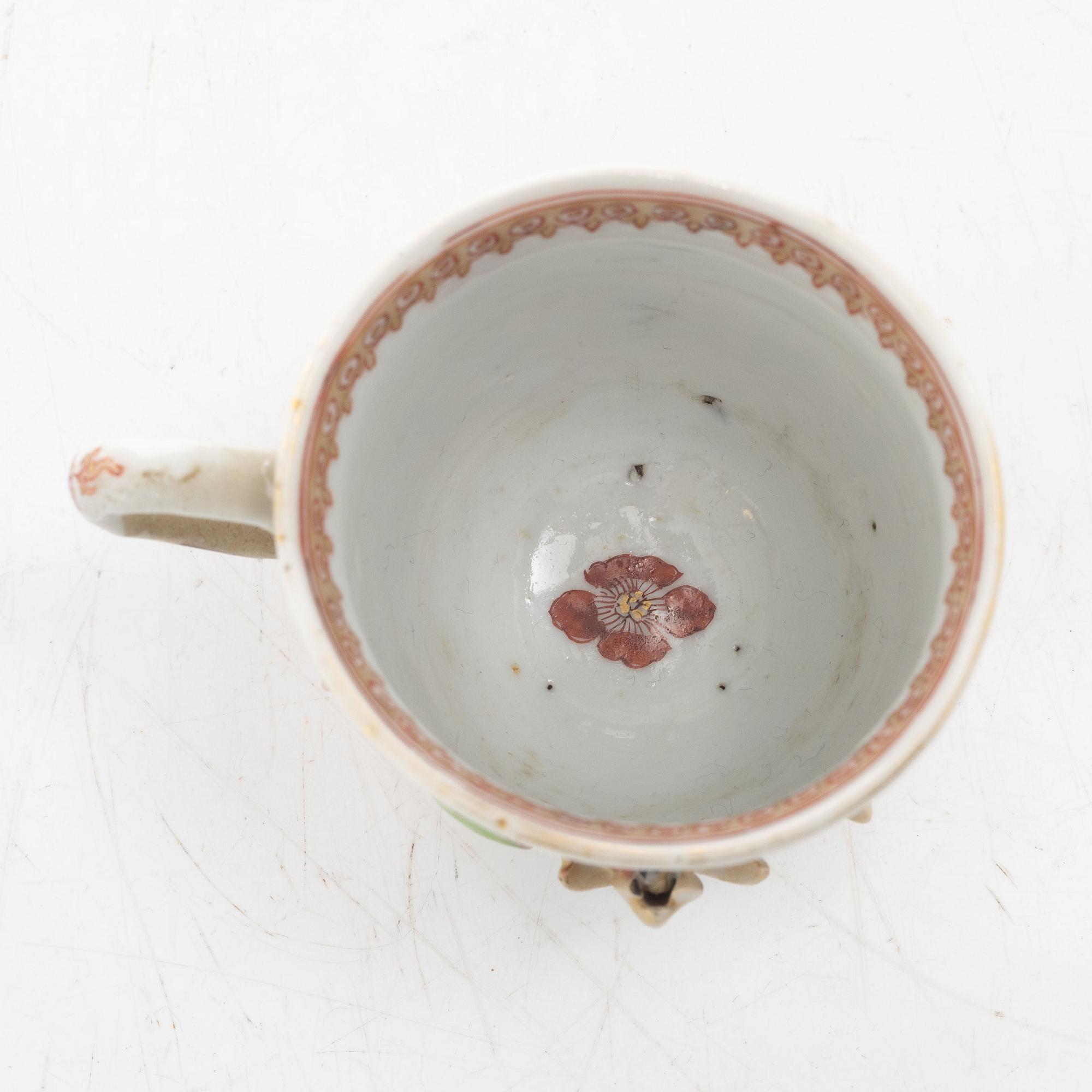 A small Chinese famille rose porcelain tureen with cover and stand, two salt cellars, Qing dynasty, Qianlong (1736-95).