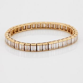 Van Cleef et Arpels armband 18K guld med baguetteslipade diamanter "Bracelet Baguette".