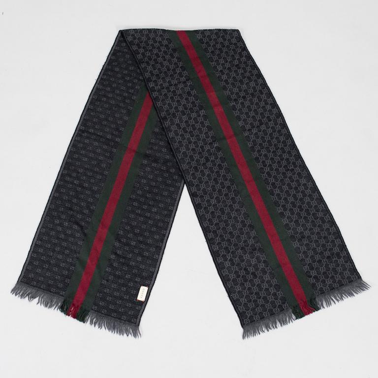 Gucci, A 'Verbier' scarf and a belt.
