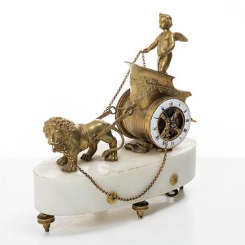 An Empire table clock, likely Northern Europe, early 19th century.