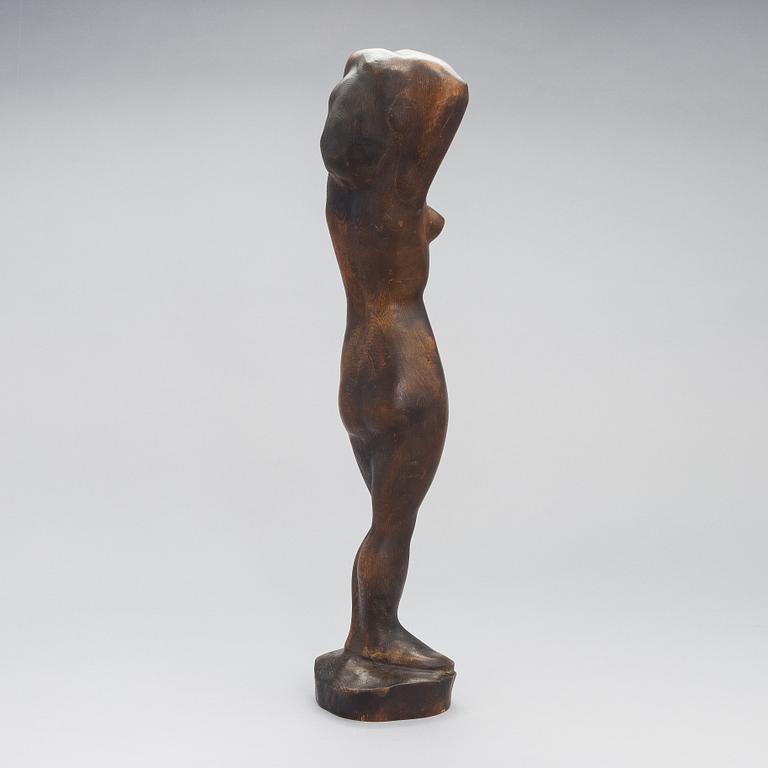 Gunnar Uotila, a wooden sculpture, signed and dated 1950.