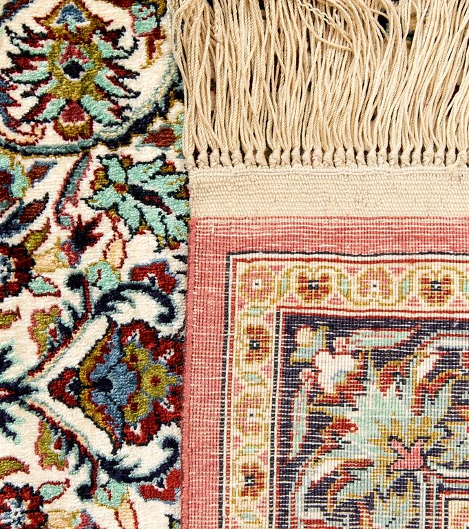 Hereke silk rug, approximately 125x70 cm.
