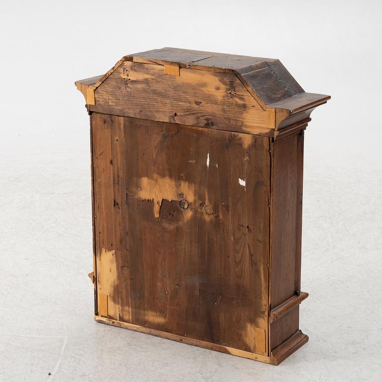 A wall cabinet, 18th century.