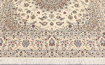 A Nain part silk carpet, c. 207 x 208 cm.