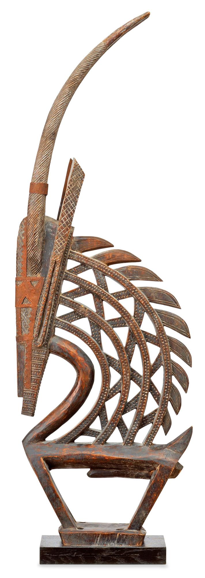 HUVUDPRYDNAD. Tshiwara/Ciwara (stiliserad antilophane). Trä med metallbeslag.
