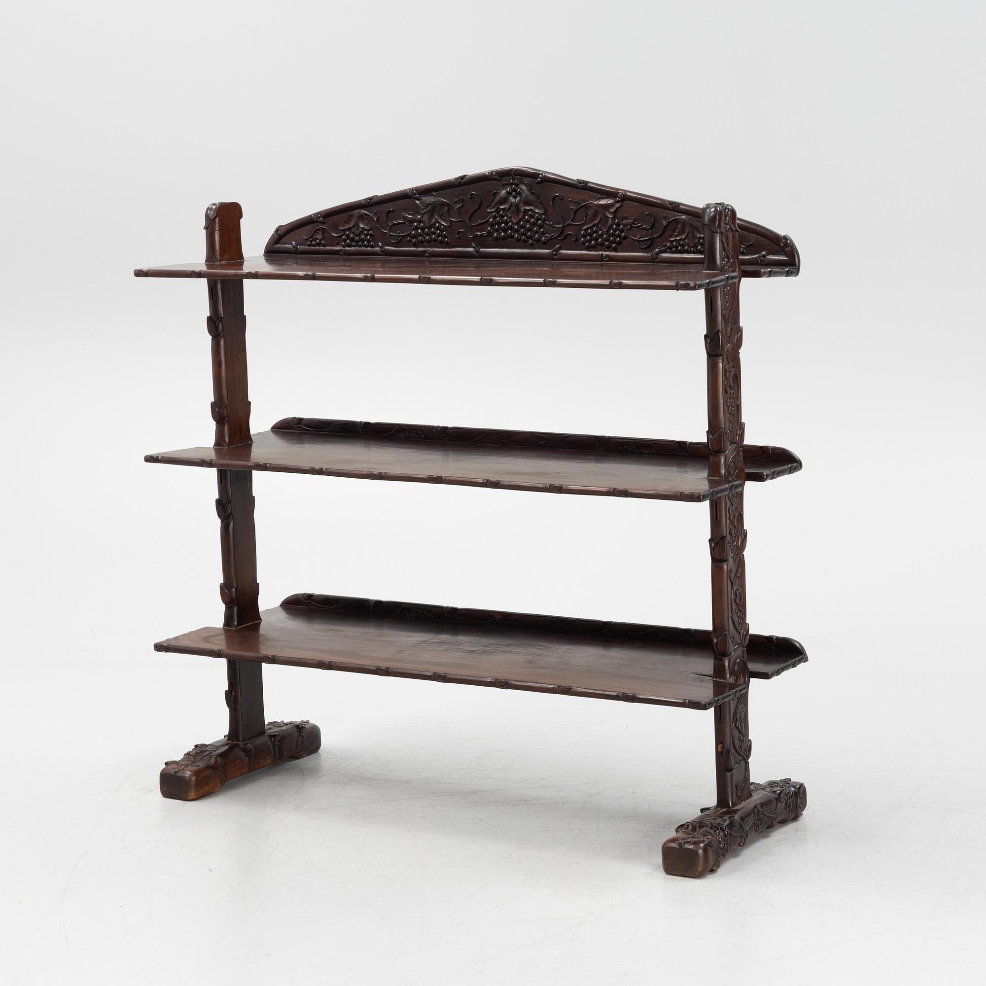 A Chinese hardwood shelf, 20th century.