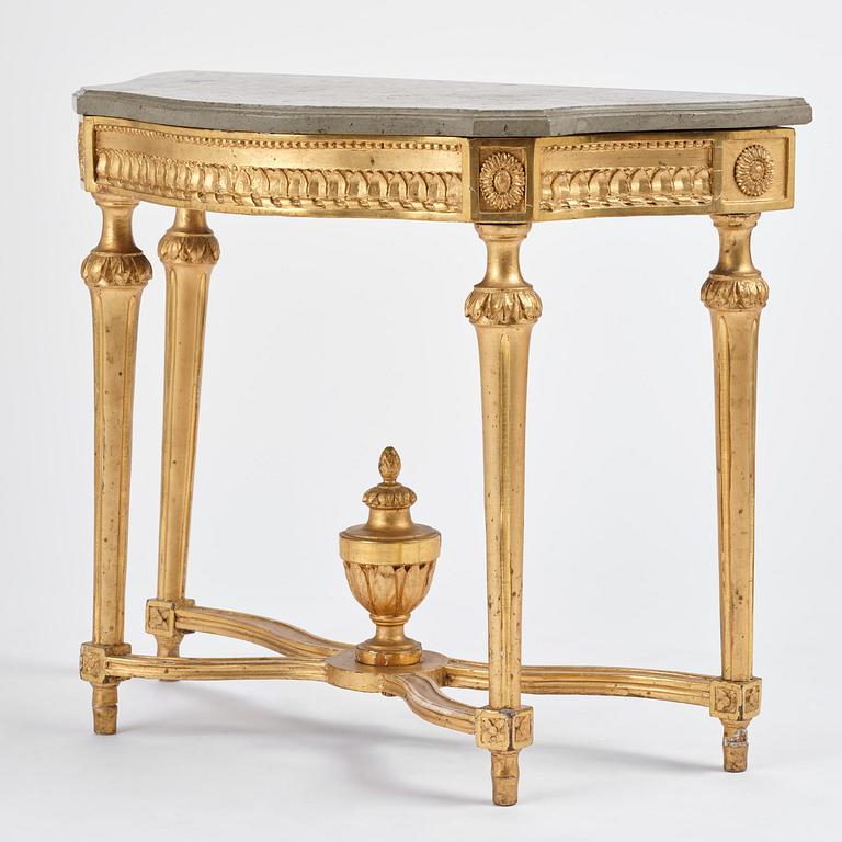 A Gustavian giltwood and limestone-top console table, Stockholm, late 18th century.
