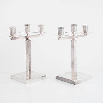 Rolf Engströmer, attributed to, a pair of silver-plated candelabra, Fabriksaktiebolaget Kronsilver, Sweden 1930s.