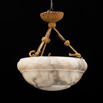 An early 20th century alabaster ceiling lamp.