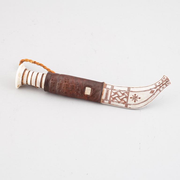Lars Pirak, a Sami reindeer horn knife, signed Lars Pirak.