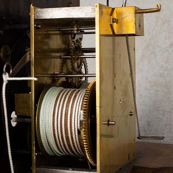 A 18th century long case clock.