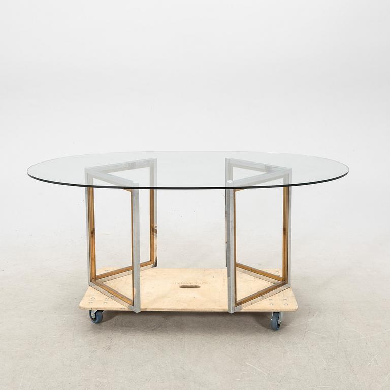 A glass and metal table by Engelsson from the 21st century.