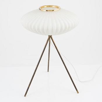 A glass and metal table lamp, probably Italy, 1960s.