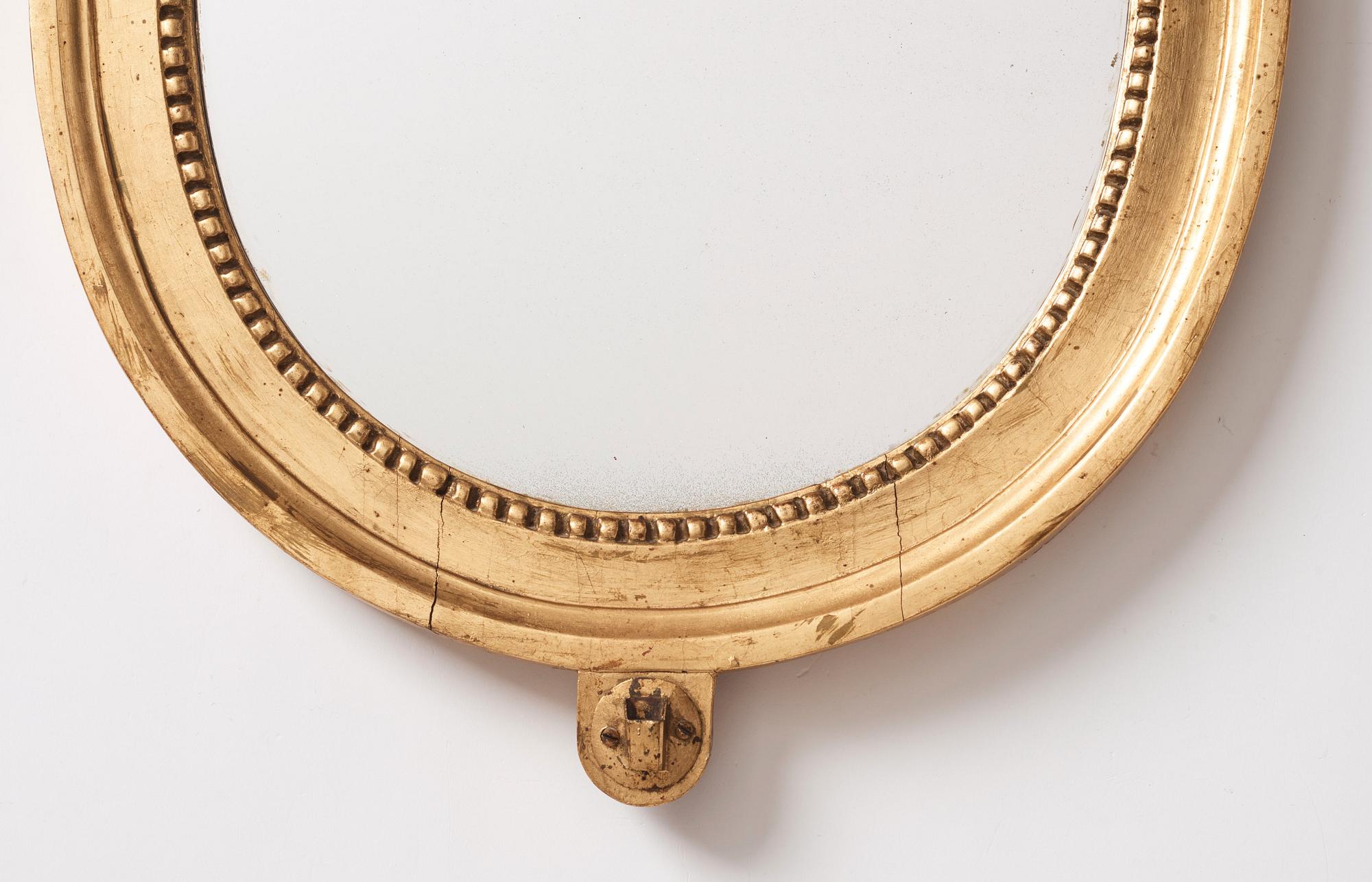 A pair of Gustavian two-light giltwood girandoles by J. Åkerblad (master 1756-1799).