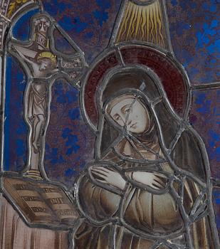 A stained glass window with St Theresa, late 19th Century.