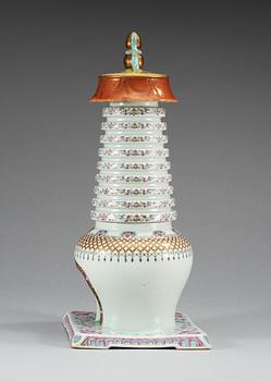 A famille rose stupa, presumably early 20th Century with Qianlong's seal mark in gold.
