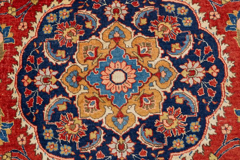 A oriental carpet, ca 320 x 223 cm.