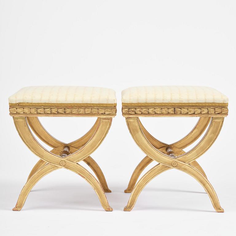 A pair of late Gustavian giltwood stools, Stockholm, late 18th century.