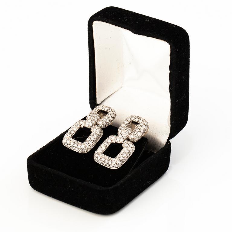 A pair of 18K white gold earrings with 230 brilliant cut diamonds, ca. 4.07 ct in total.