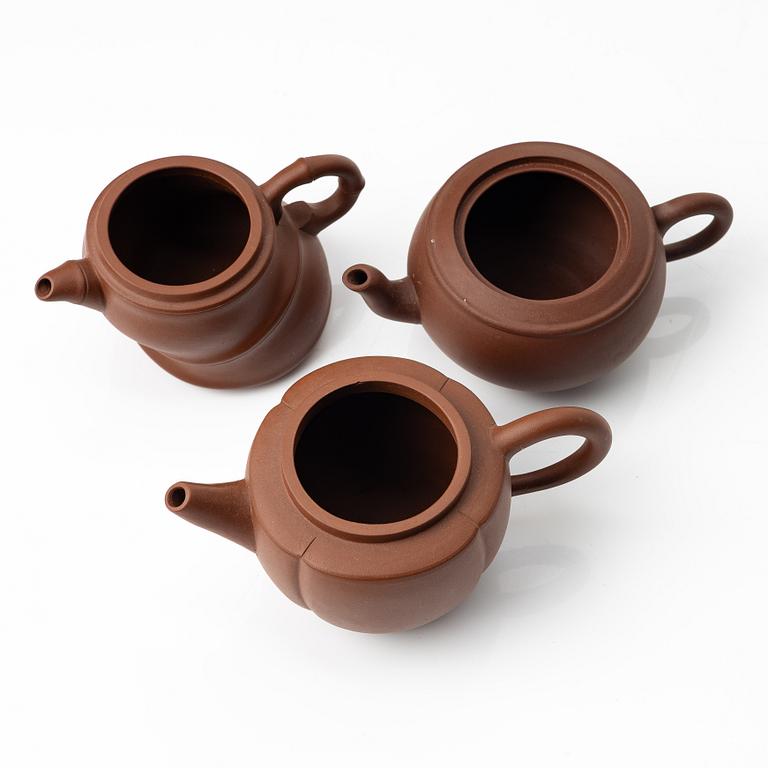 A group of three yixing 'gongfu' teapots, China, 1980s.