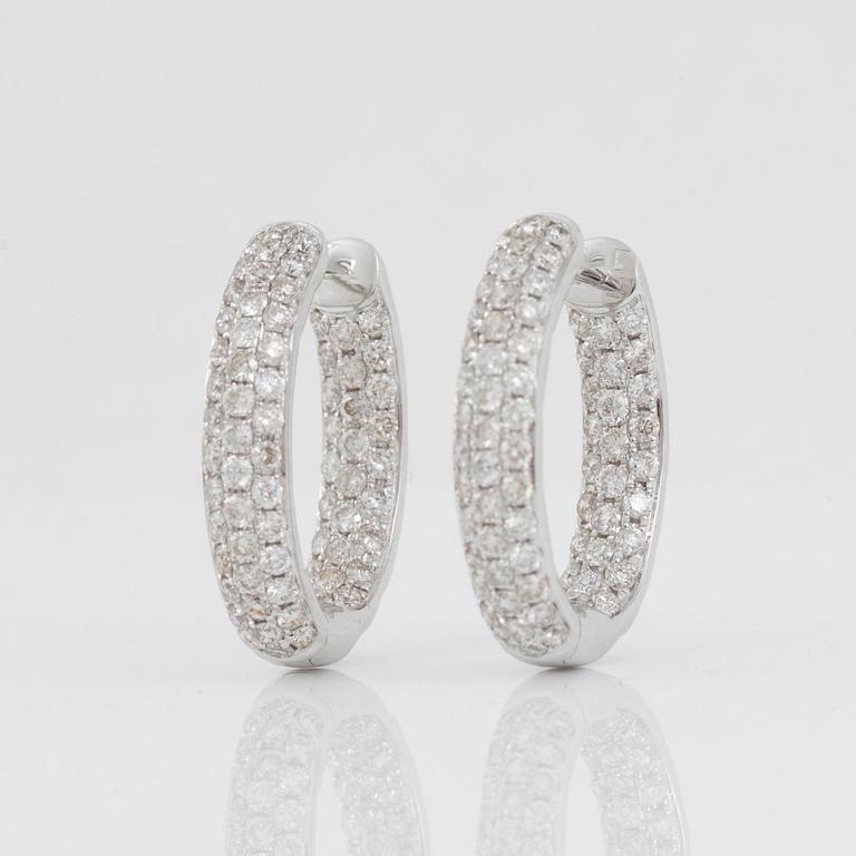 A pair of oval hoop diamond earrings, 1.71 cts according to engraving.