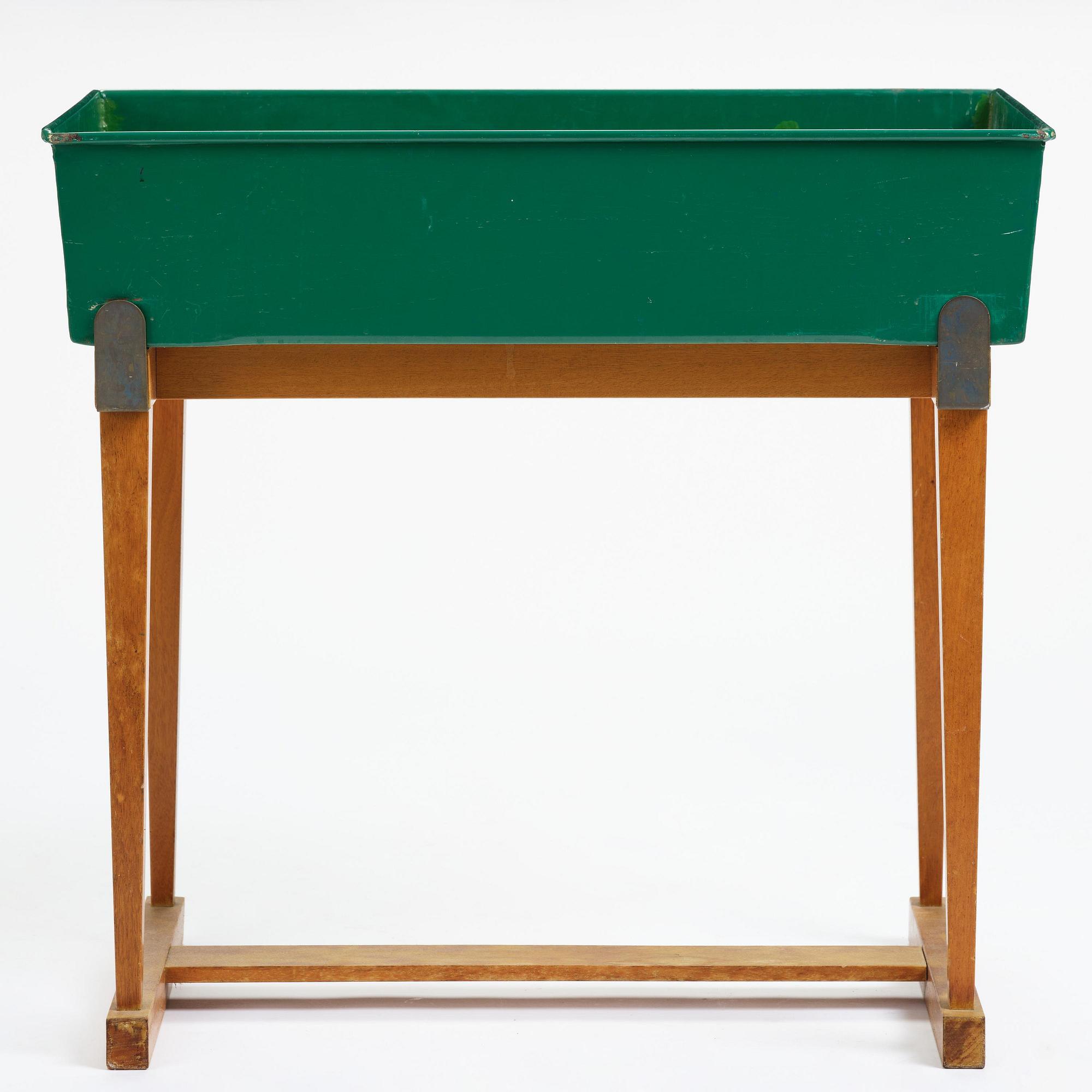 Josef Frank, a rare flower table with green lacquered box model "B 2084", Firma Svenskt Tenn, Sweden, 1950-60s.