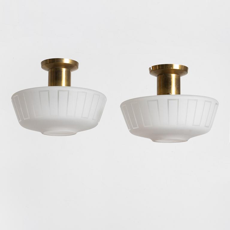 A pair of Swedish Modern ceiling lamps, 1940s/50s.