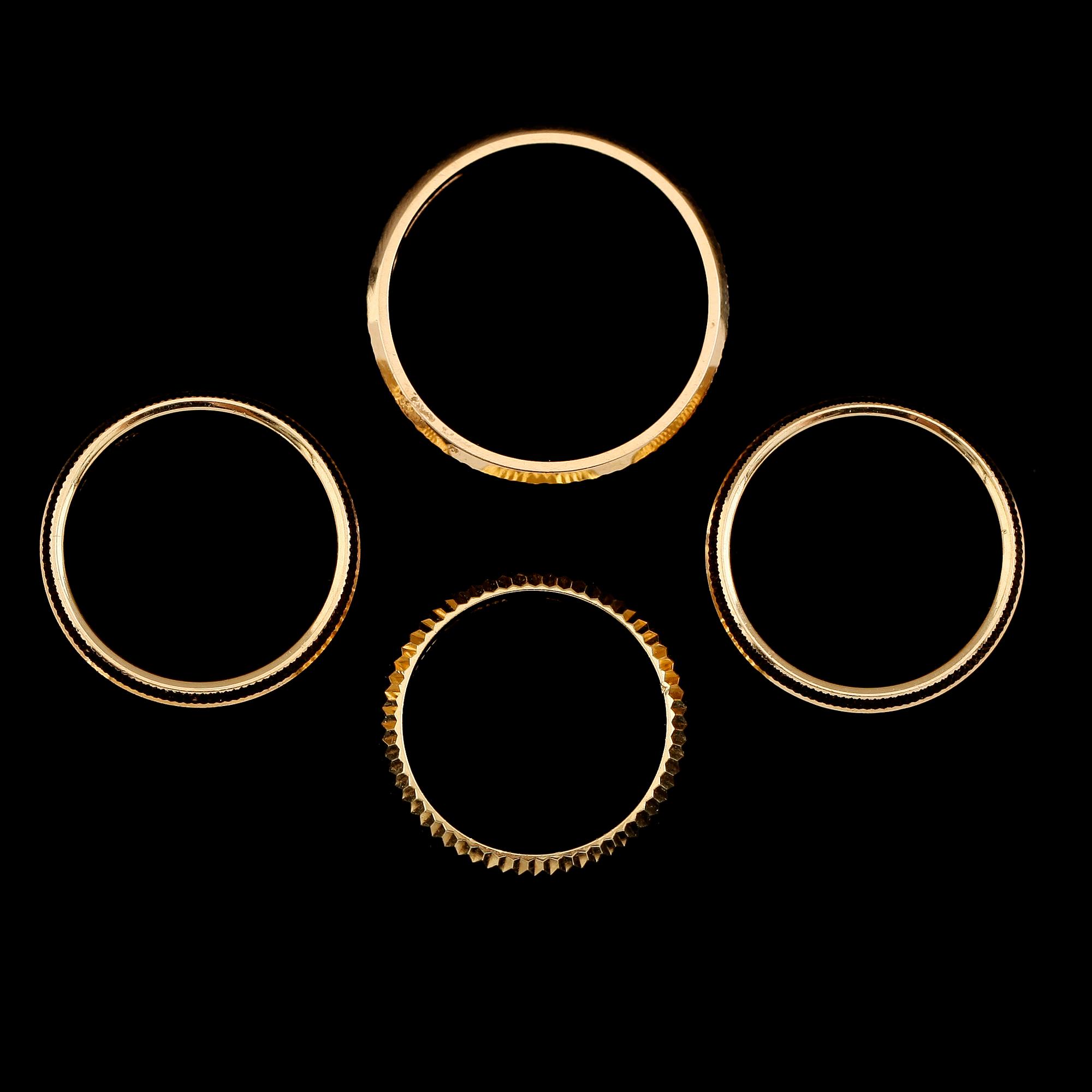 RINGAR, 4 st, 18 k guld, 1900-talets andra hälft. Vikt ca 22 gram.