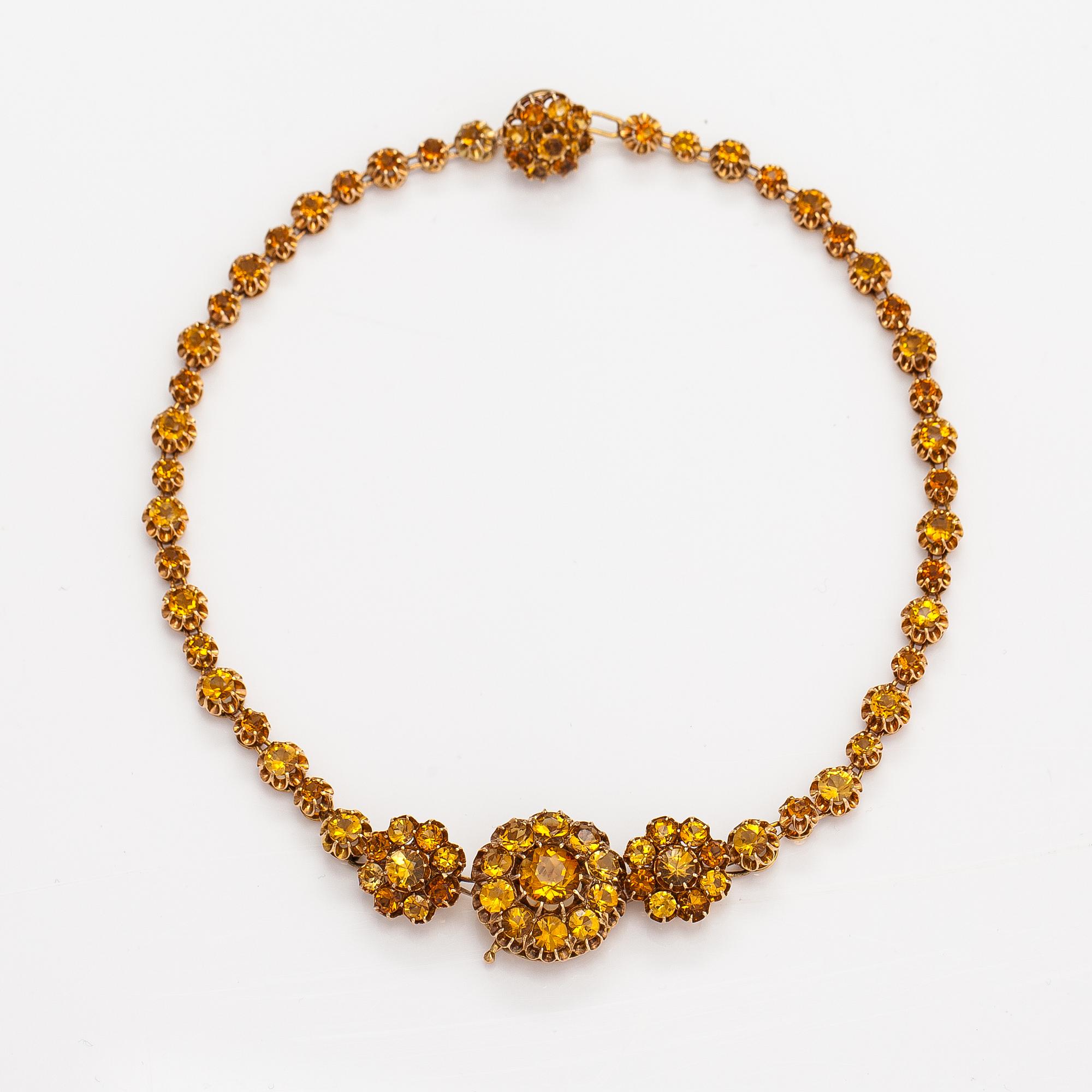 Torbjörn Tillander, A 14K gold jewellery suite with citrines. Helsinki 1981.