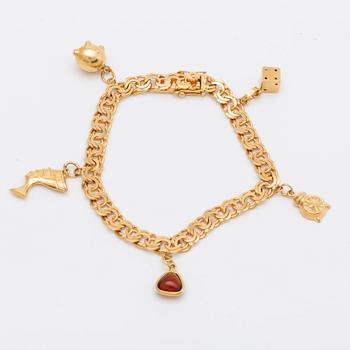 Bracelet, 18K gold with charms, approx 19 x 0,6 cm, 19,6 g, Borgings Guldsmide Göteborg 1962.