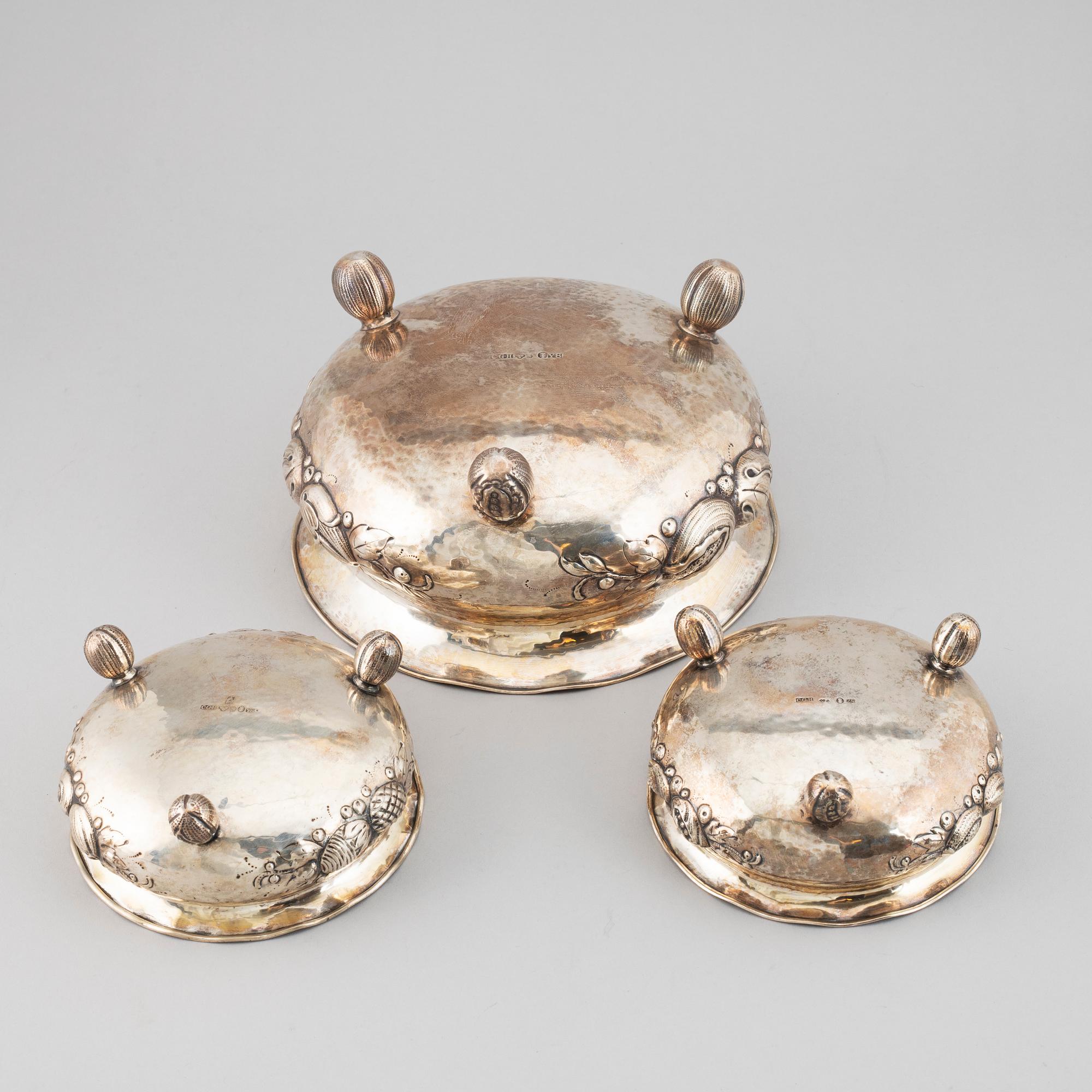 A set of three BAroque style silver bowls, maker's mark CG Hallberg, Stockholm, 1949-1950.