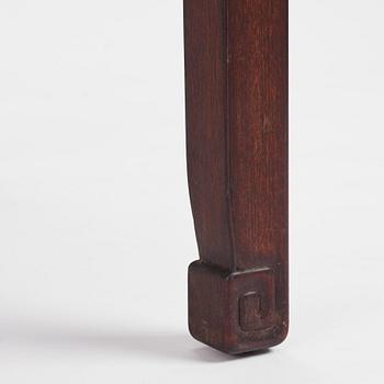 A Chinese hardwood corner-leg table, Qing dynasty.