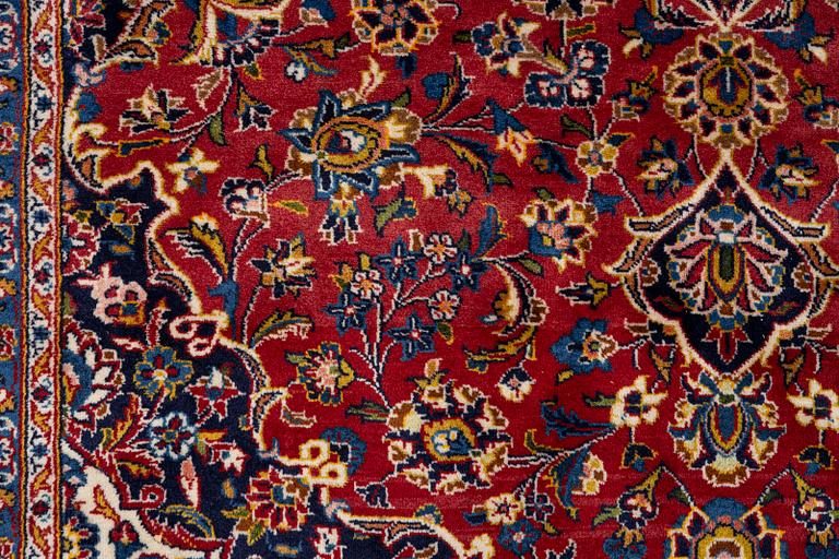 An oriental carpet, c. 340 x 240 cm.