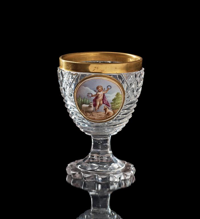 A Russian cut glass goblet with Cupid, Imperial Glass Factory, early 19th Century.